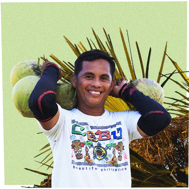 picuture-of-a-man-carrying-coconuts